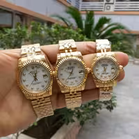 ساعتمچی ست مردانه و زنانه رولکس بند استیل بدنه استیل موتور درجه یک rolex