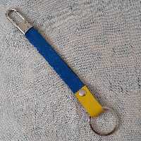 آویزکلیدوسوییچ چرم طبیعی بزدستسازبایراق نقره ای بادورنگ