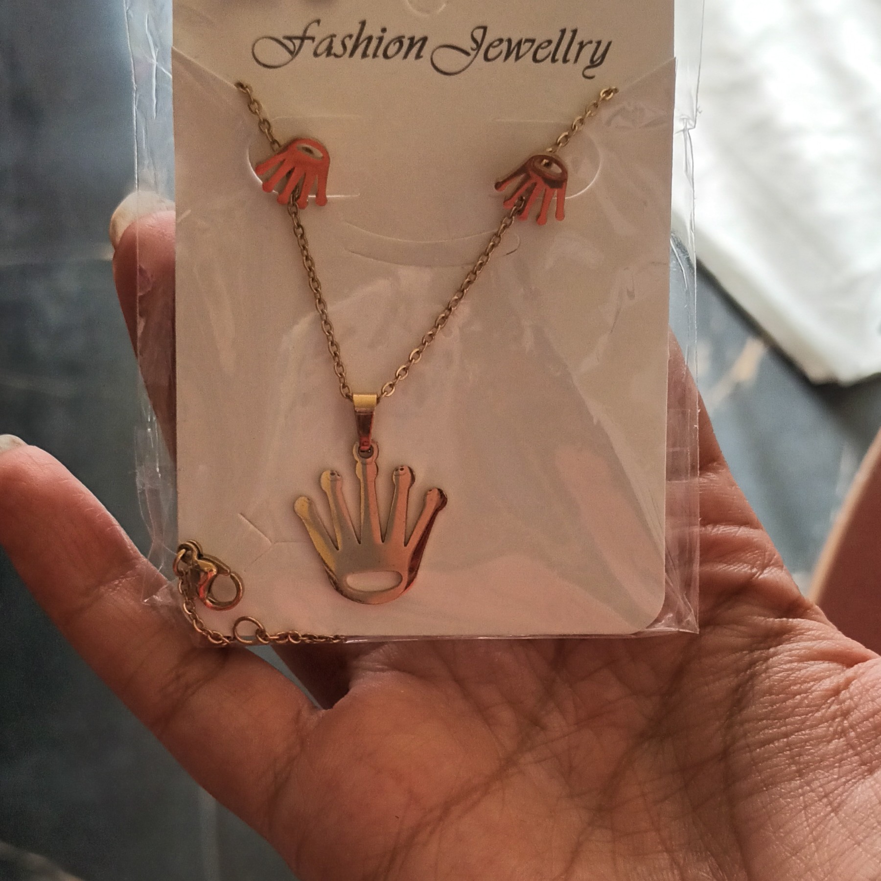 نیم ست استیل طرح دست نقره ای