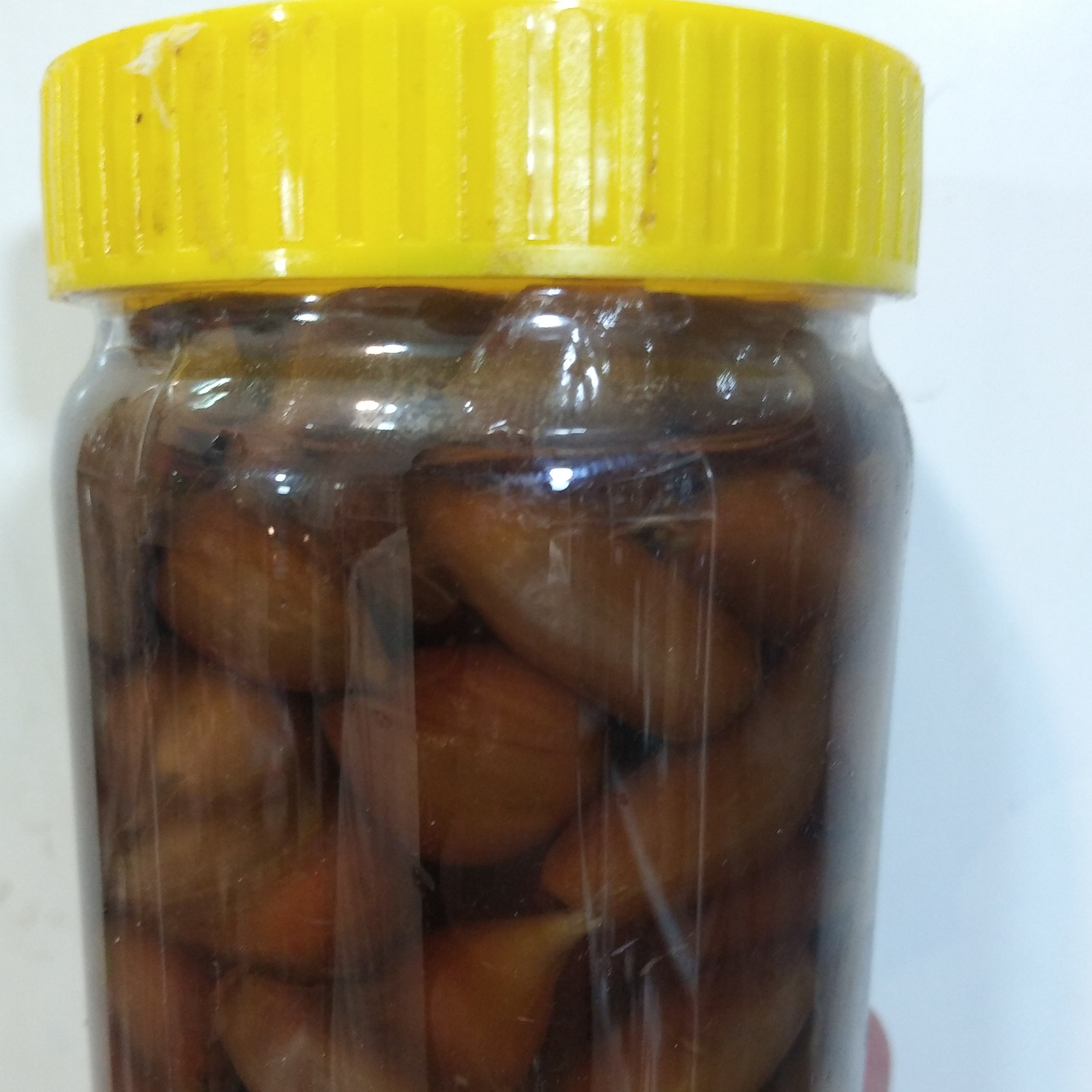 سیر ترشی با سیر تند و خوشمزه همدان  باسرکه انگور طبیعی