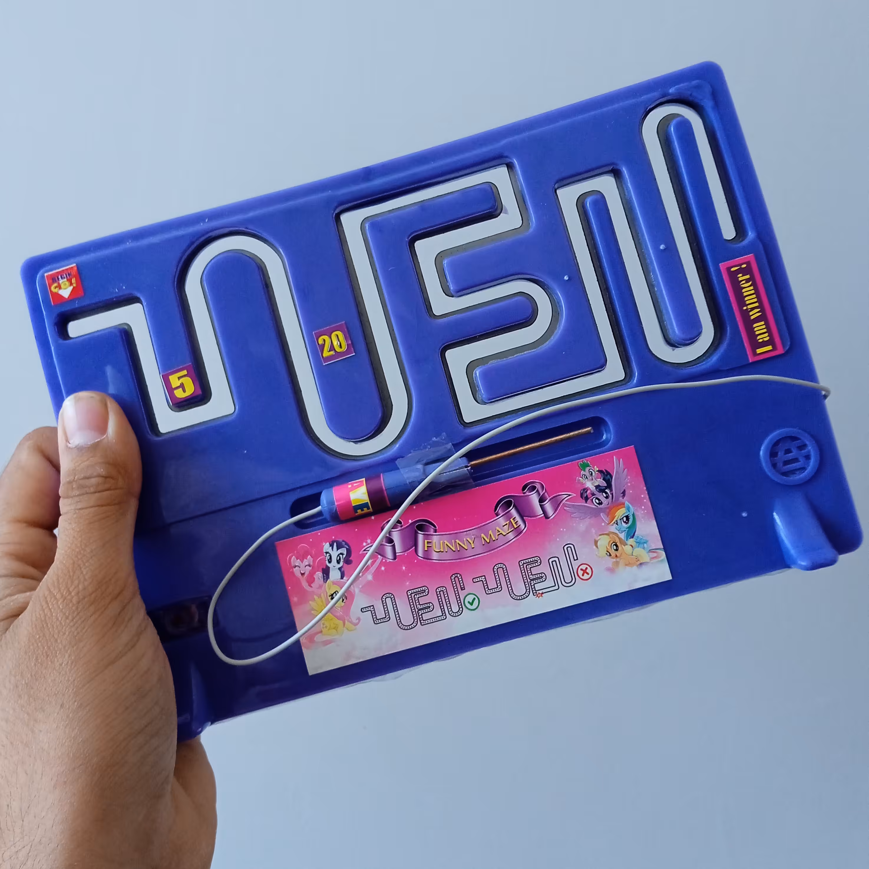 اعصاب سنج باطری خور  چراغ دار و صدا دار در سه رنگ بنفش نارنجی و سبز بازی آموزشی و سرگرمی بازی فکری