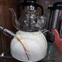 کتری قوری لعابی قوری پیرکس حرارات مستقیم همراه چای صاف کن استیل 