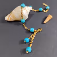 دستبند با زنجیر استیل و مهره فیروزه رنگ ثابت 