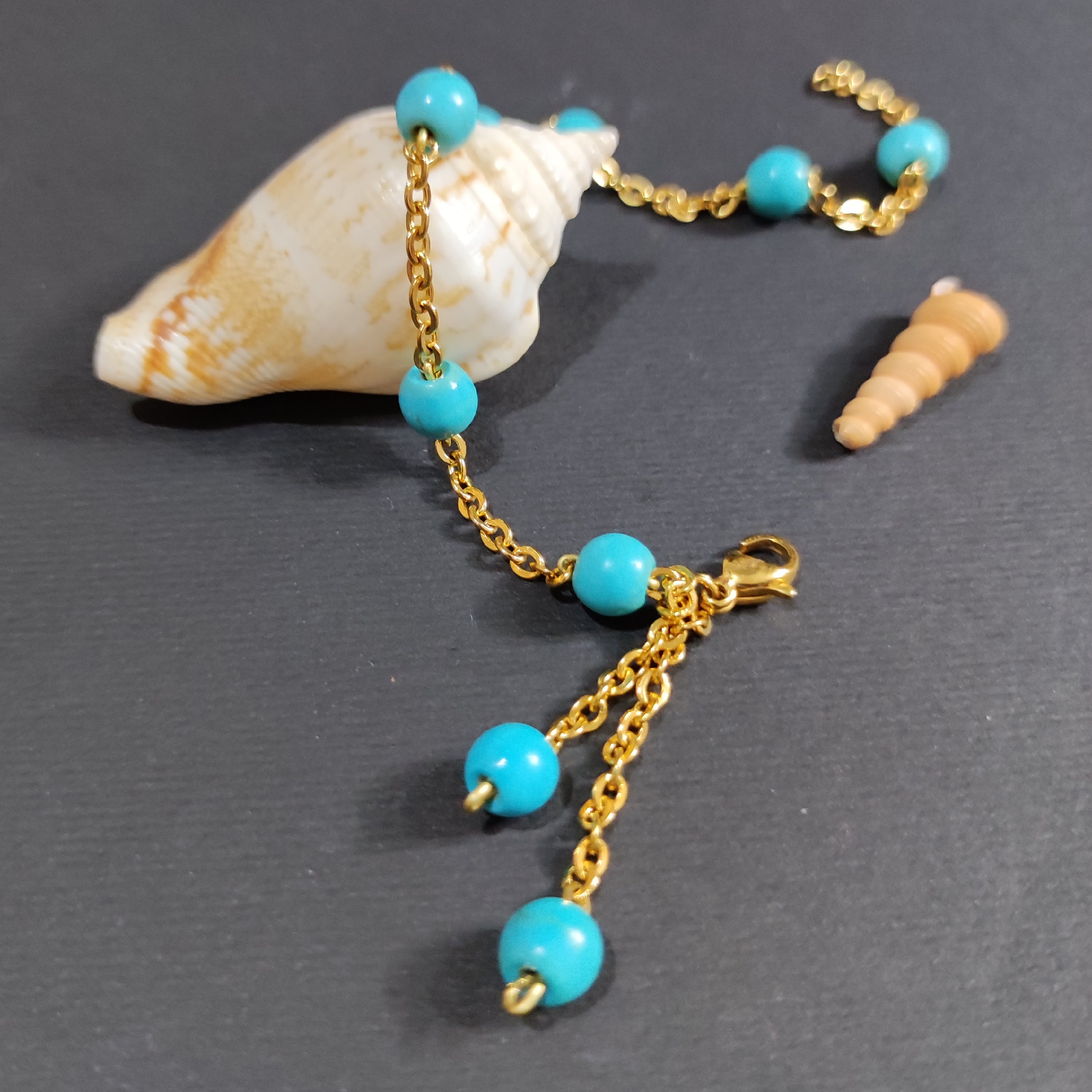 دستبند با زنجیر استیل و مهره فیروزه رنگ ثابت 