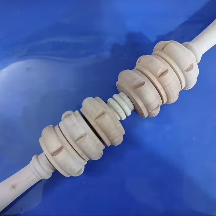 ماساژور چوبی وردنه ای