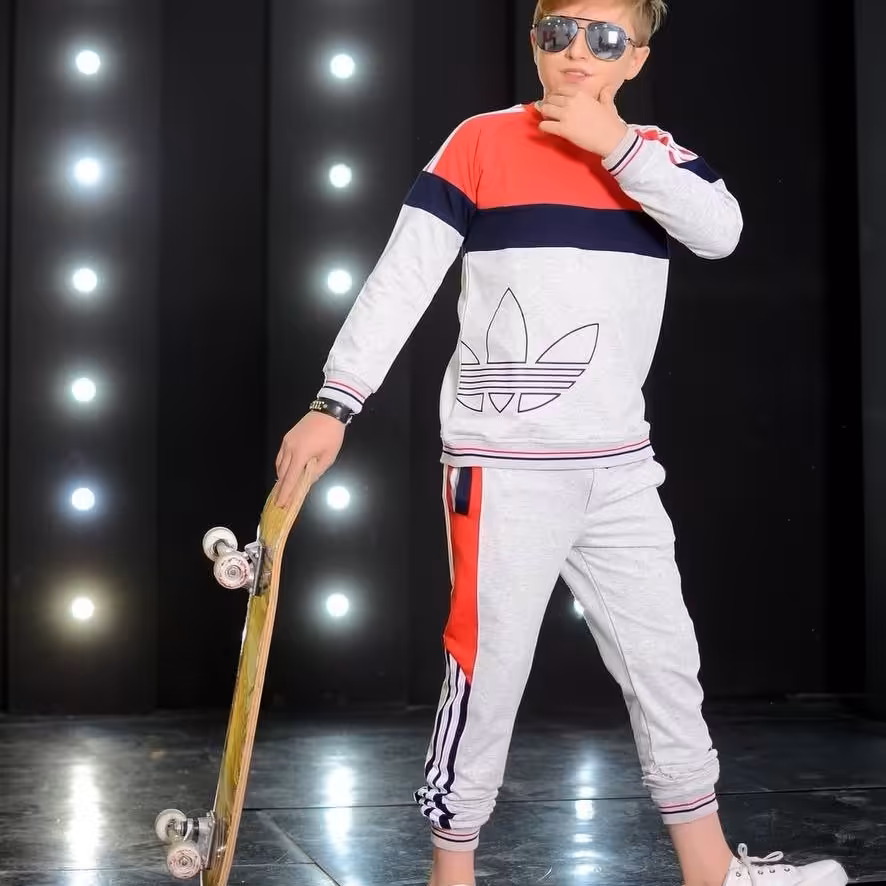 ست پسرانه و دخترانه پاییزه بهاره  اسپرت آدیداس مناسب 7تا12ساله جنس دورس ملانژ دو رنگ