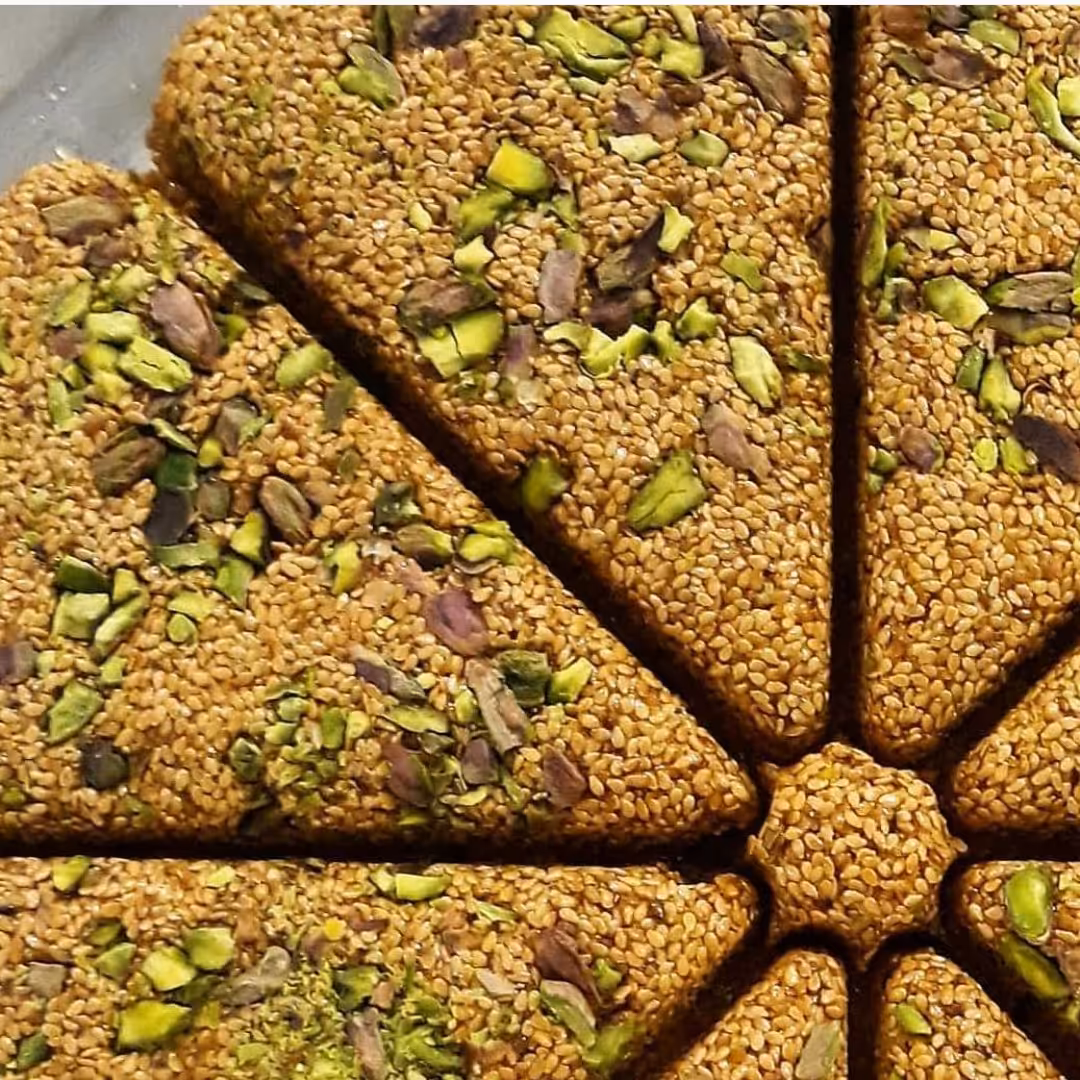 معجون کنجدی، ترکیب بی نظیر کنجد، پسته ، نارگیل و شکر. ( 800 گرم) 4بسته 