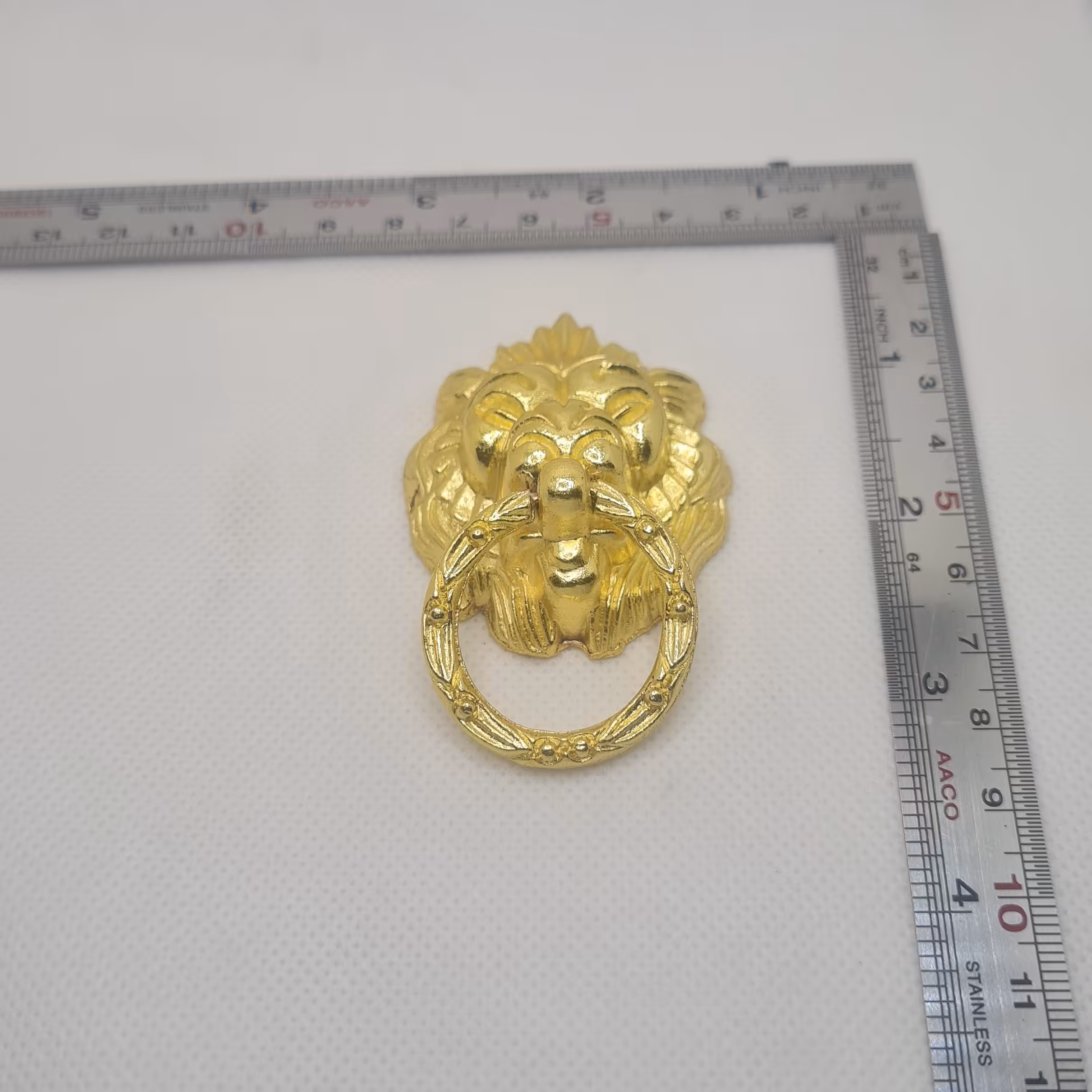 دستگیره مدل گوشواره ای کله شیر  طلایی