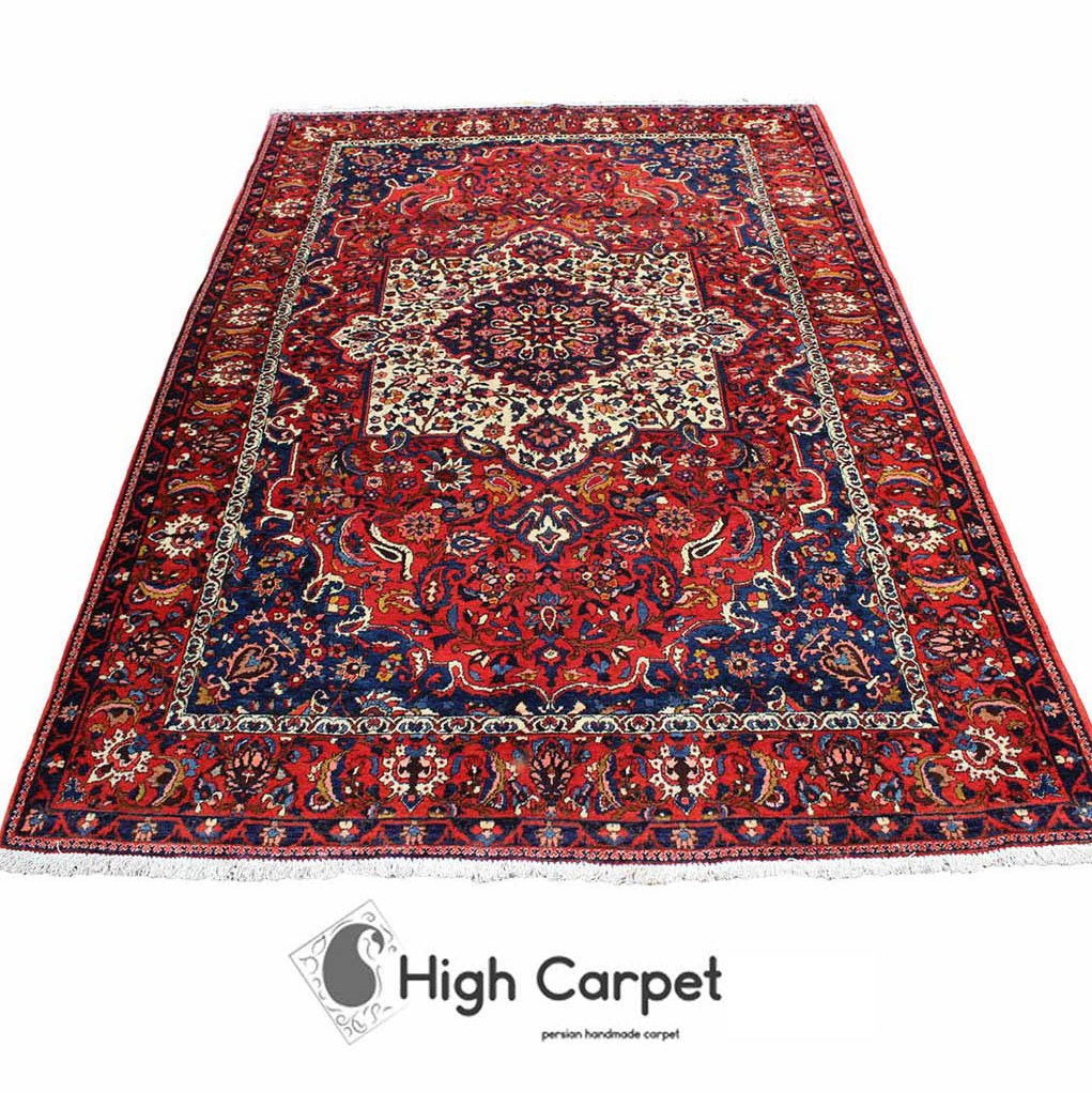 فرش دستبافت بختیار عشایر بافت زمینه قرمز لاکی شش متری کد 0030