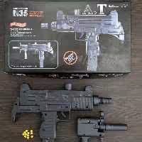 اسباب بازی تفنگ ساچمه ای خشابی یوزی 