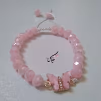 دستبند کریستال صورتی مات جذاب با پلاک پروانه