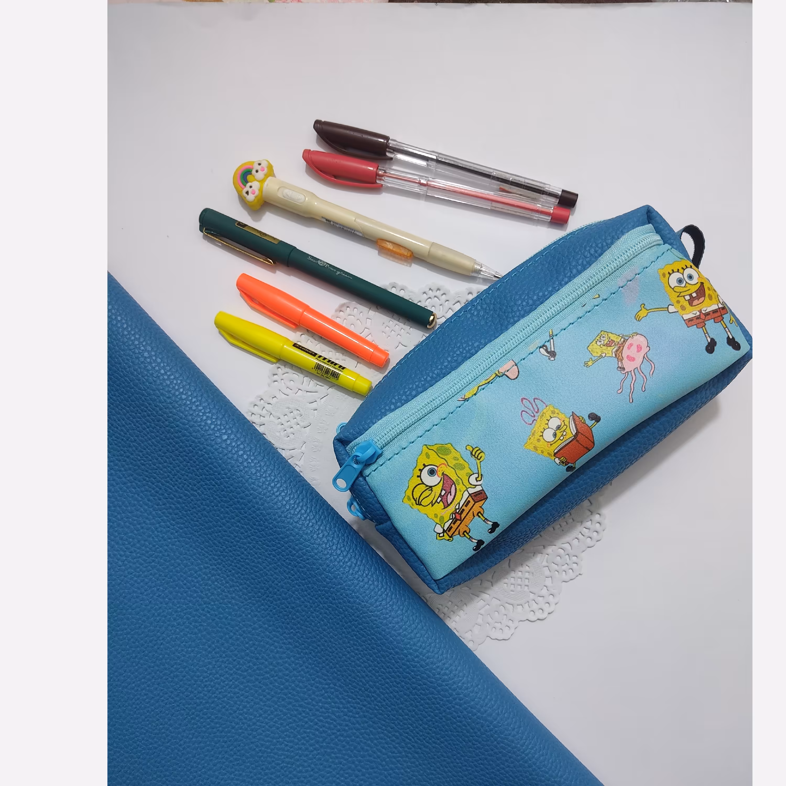 جامدادی چرمی سه زیپ باب اسفنجی آبی با چرم مصنوعی فانتزی