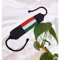 دستبند پرچم ایران  بافت پهن دونیم سانت پهنا دارای گره کشویی برای بسته شدن