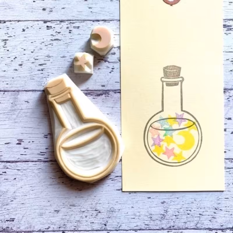مهر دستساز بطری کوچولو پک بانکه شیشه ای با ماه و ستاره کوچک مناسب تزیین کاغذ پارچه و ساخت تگ