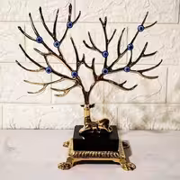 جا جواهری وچشم نظر گوزن برنزی با پایه سنگ مشکی و سفید یه کار جذاب وخاص