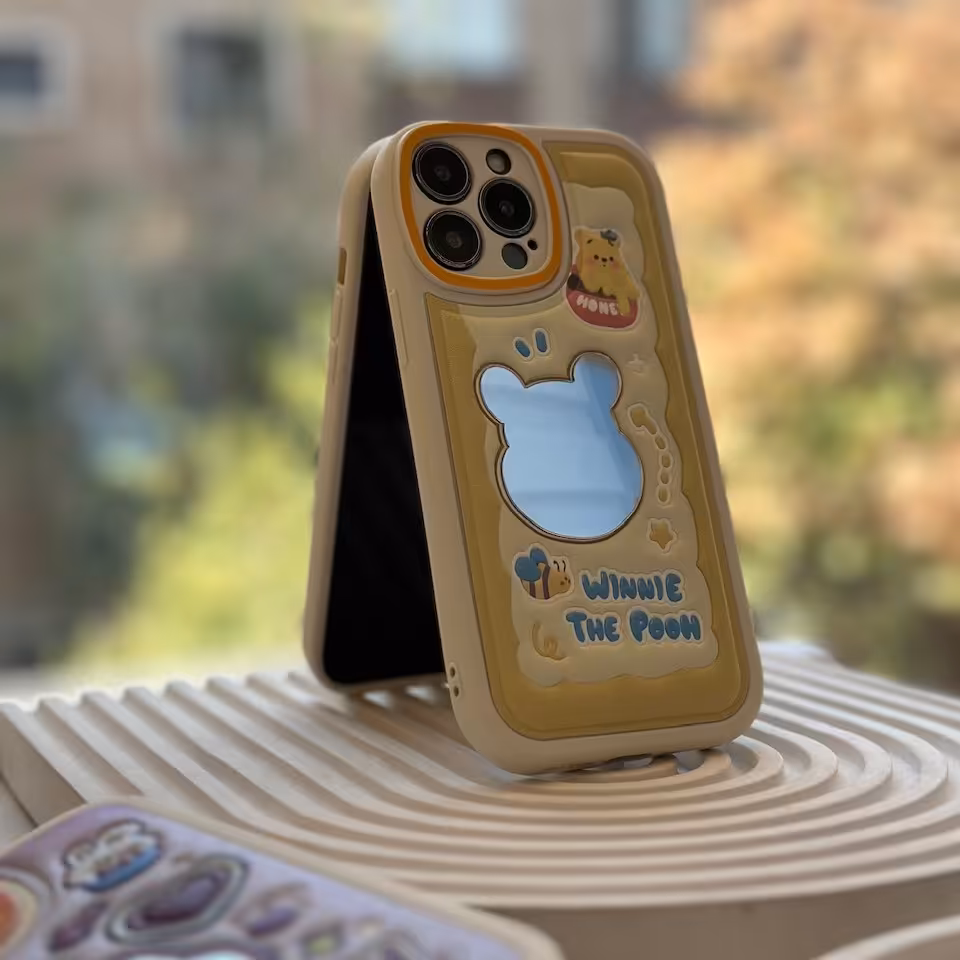 قاب pooh برجسته چرمی آینه دار برای آیفون سری 11 به بالا