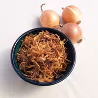 پیاز داغ خلالی خانگی نــیــازتــ مــیــشــهــ (100 گرم)