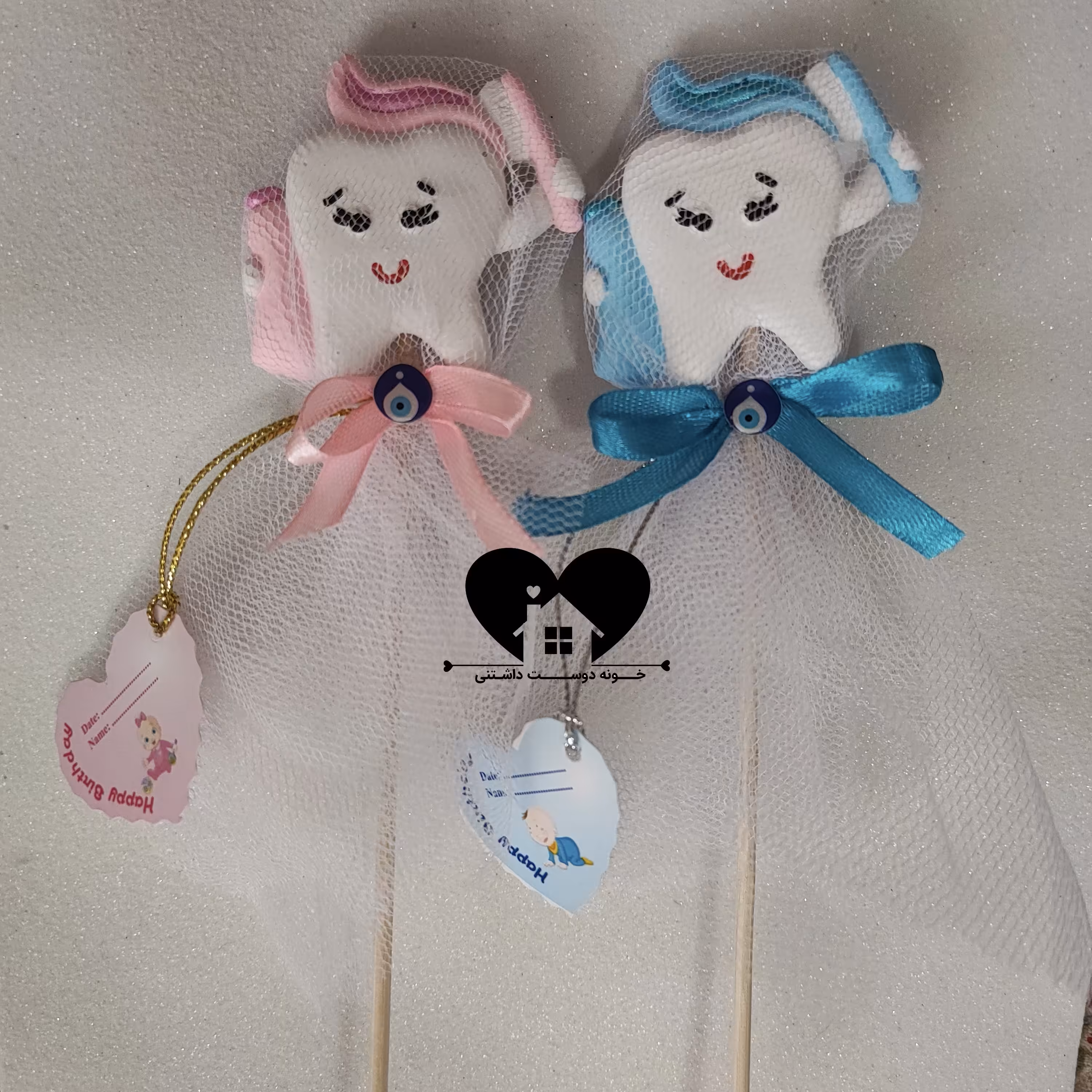 گیفت دندونی گیفت دندون جشن دندونی گیفت دندان گیفت دندانی هدیه دندون پزشکی  مسواکدار بهمراه تور پاپیون چشم نظر و اسم آویز