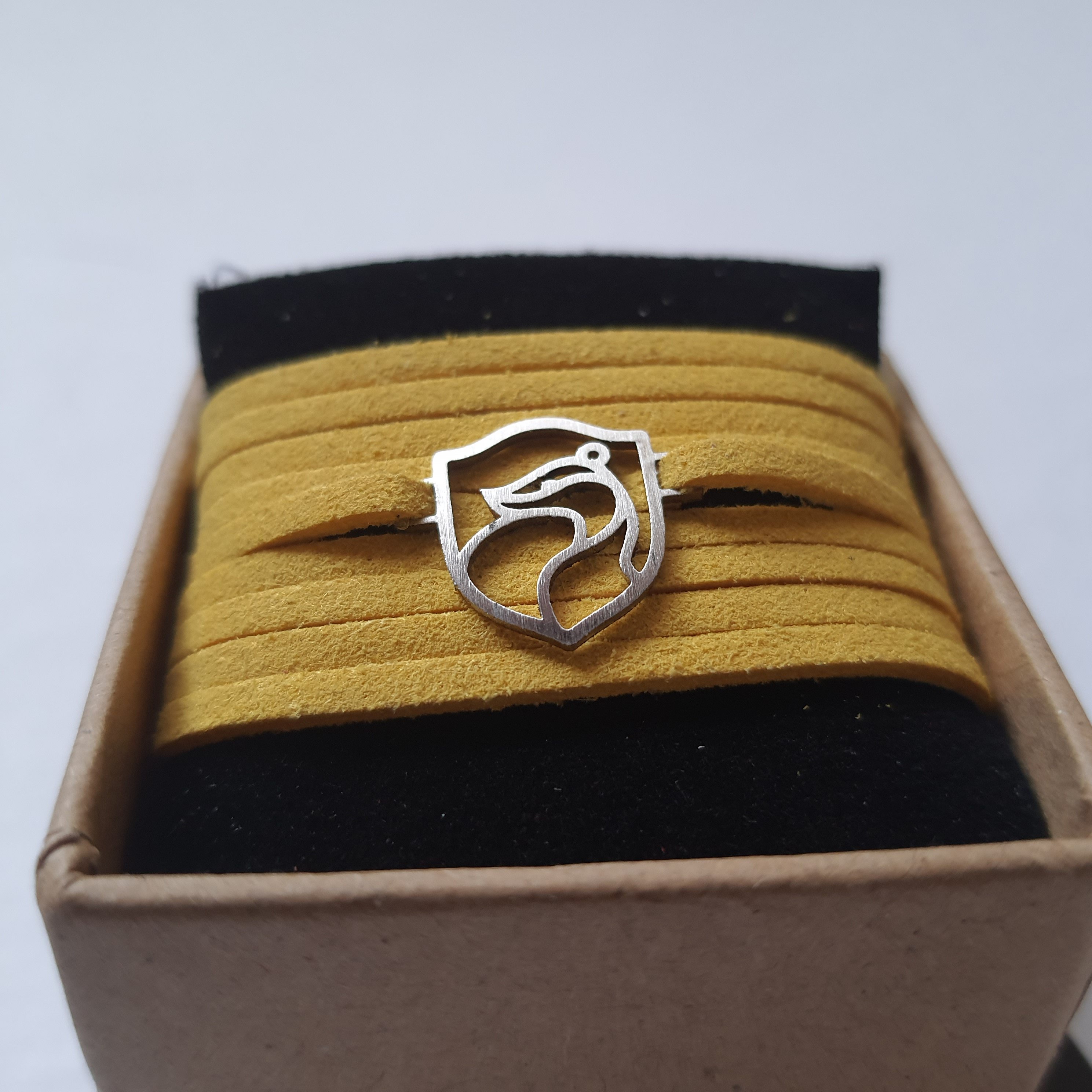 دستبند استیل گروهبندی هافلپاف از مجموعه هری پاتر