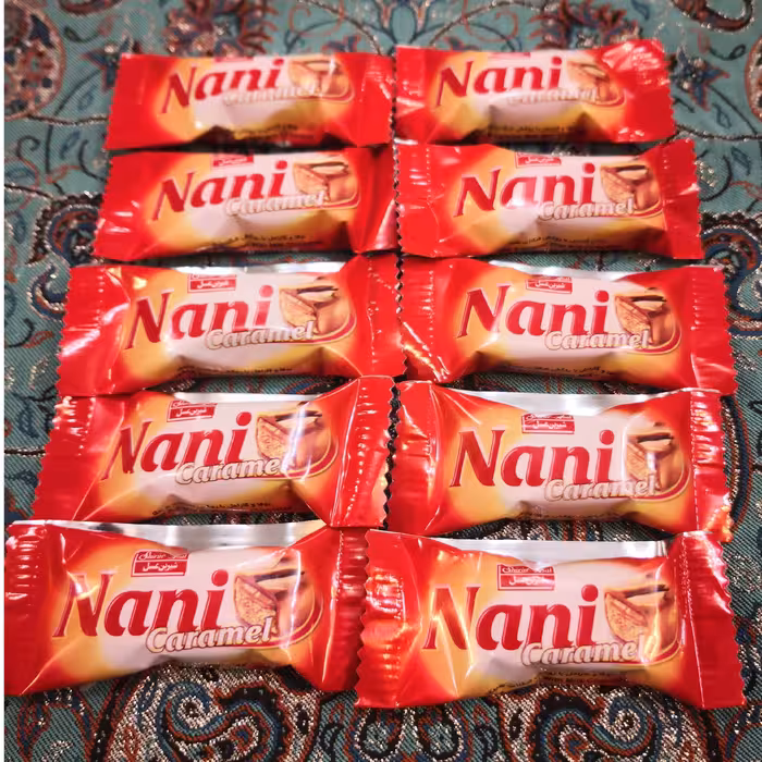 شکلات مغز دار نانی شیرین عسل 8 گرمی بسته 20 عددی