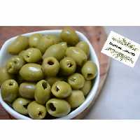 زیتون کنسروی بی هسته ویژه  برداشت شده از باغات رودبار  در بسته بندی یک کیلویی