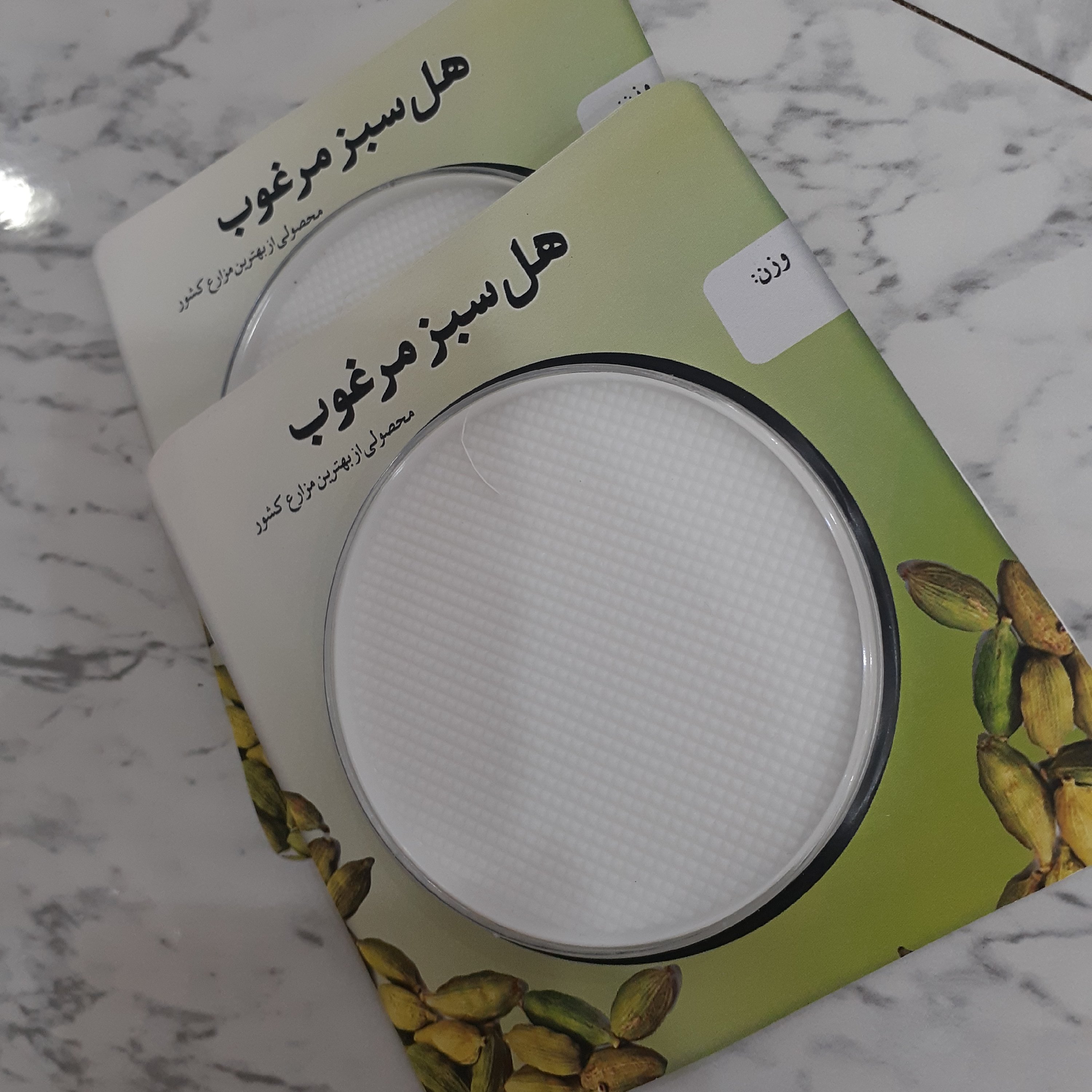 بسته بندی پودر هل با طلق گرد مخصوص یک مثقال (20 عدد)