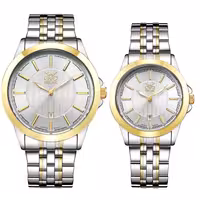 ست ساعت مچی عقربه ای زنانه و مردانه اوبلاک مدل 72709 رنگ دو رنگ صفحه سفید