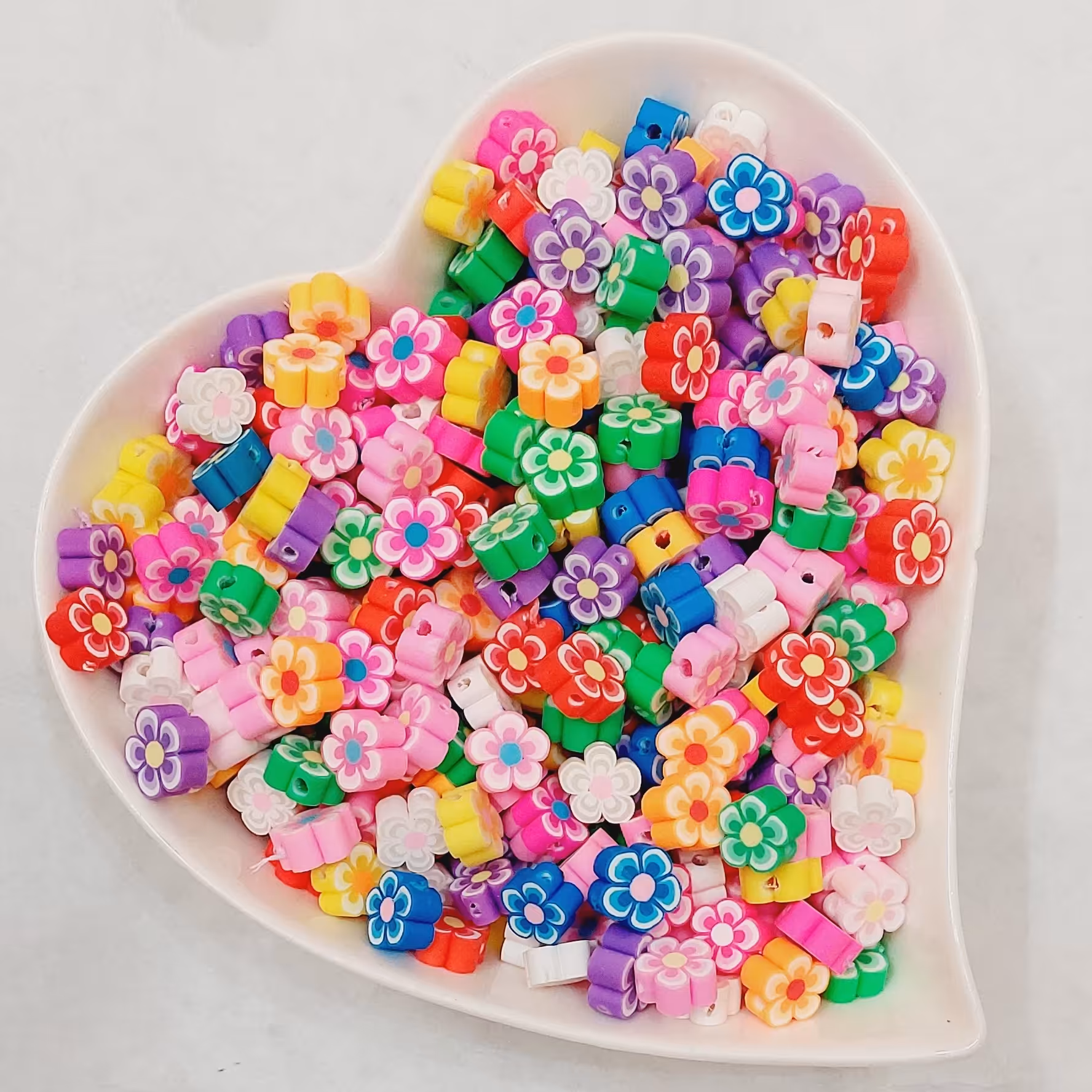 فیمو طرح گل فیمو اشکال (بسته های40عددی) طول1سانت فیمو گل 