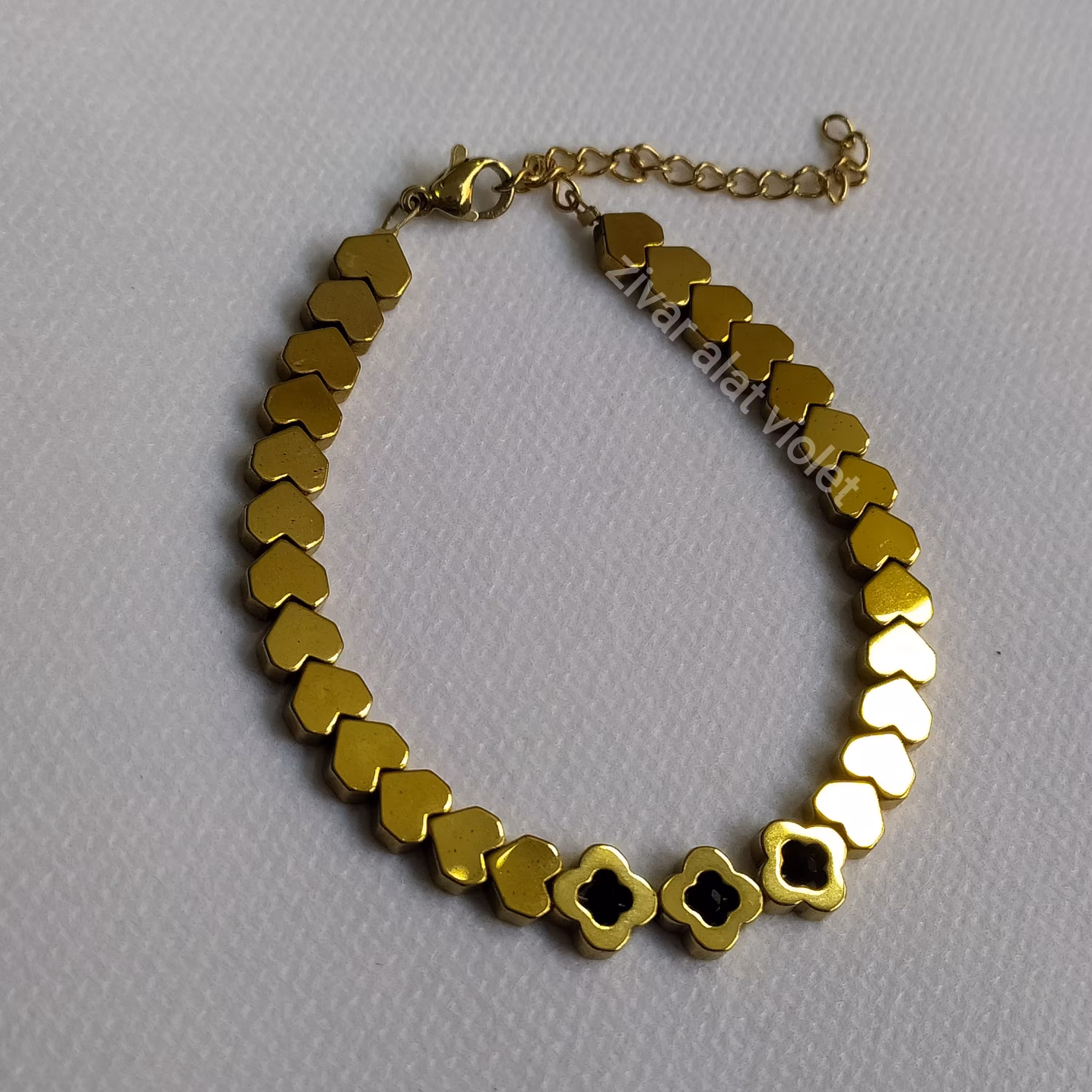 دستبند سنگ حدید قلب طلایی و مدل گل