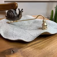 شمع خاموش کن (اسنوفر برنجی)