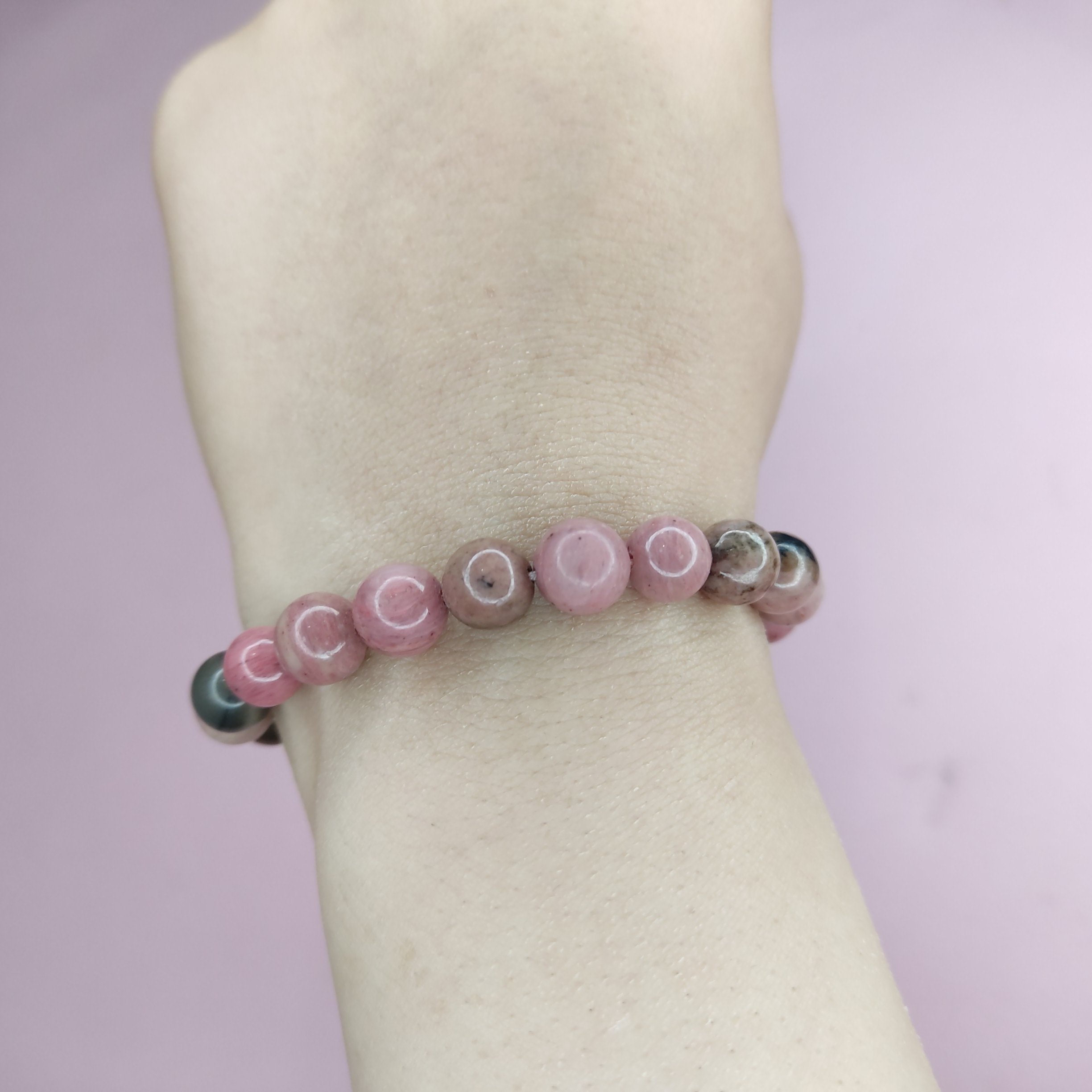 دستبند دخترانه و زنانه سنگ رودونیت صورتی درجه یک و معدنی تراش گرد ساده سایز 8 میل