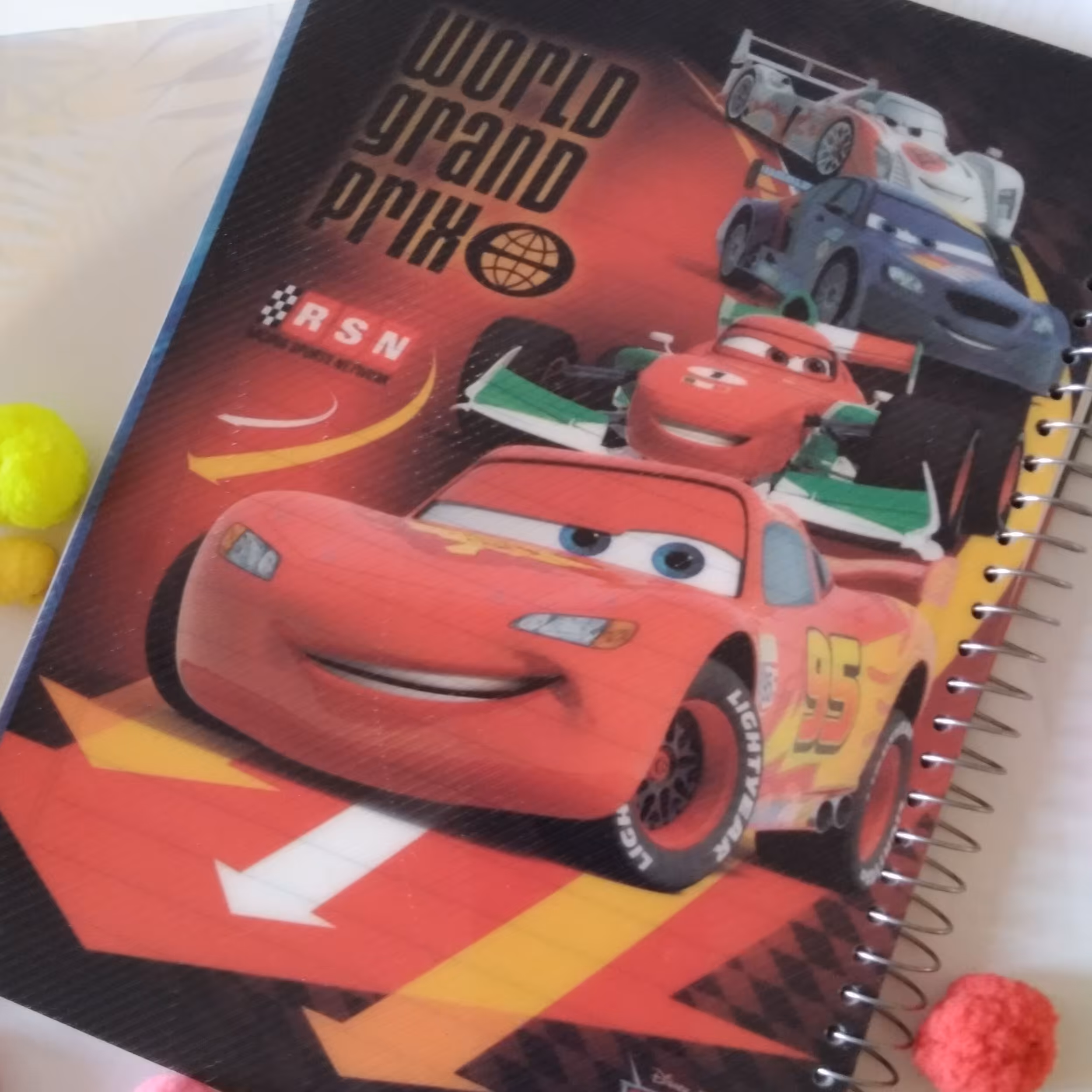 دفتر سیمی 100 برگ جنس طلقی کارتون ماشین قهرمان