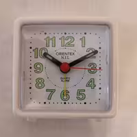 ساعت رومیزی زنگ دار اورینتکس سفید