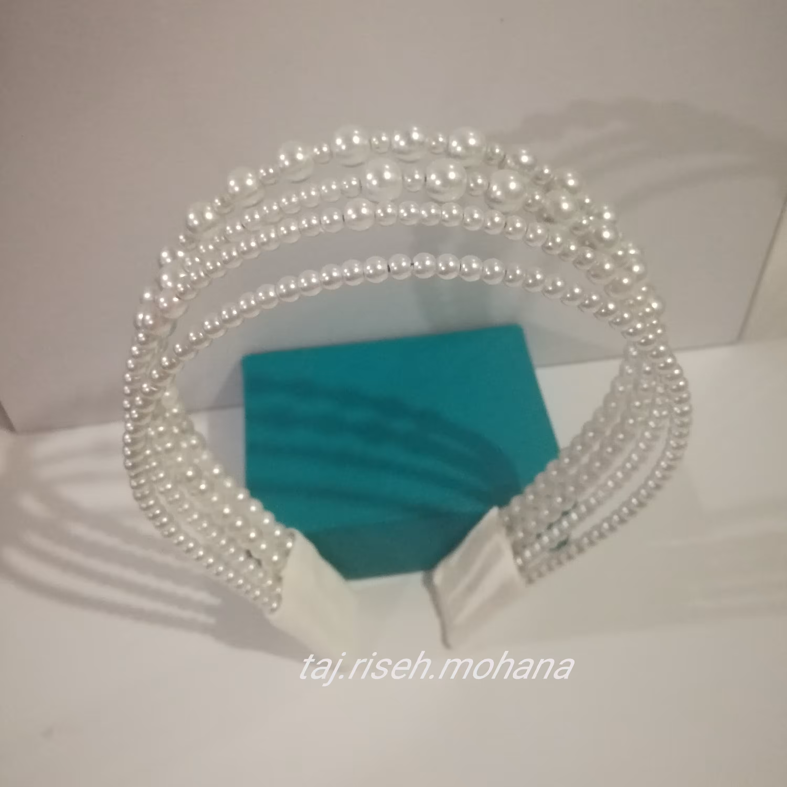 تل مروارید چند تایی با مروارید سنگی مروارید ها در سایز های مختلف با وزن تقریبی 65 گرم