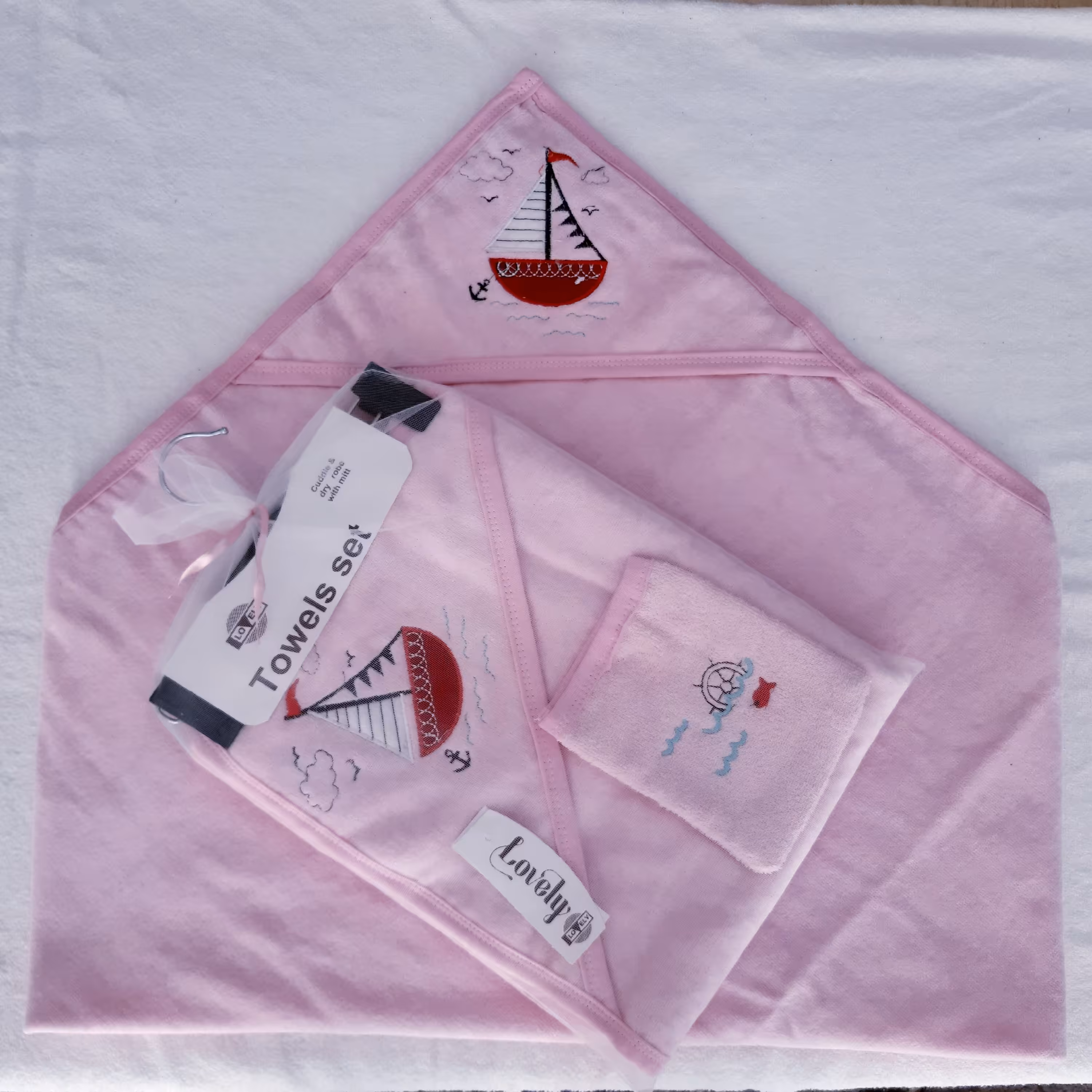 حوله نوزادی 2 تکه طرح قایق صورتی