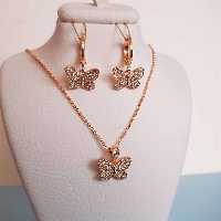 نیم ست زنانه  گردنبند و گوشواره پروانه نگین دار رنگ ثابت  