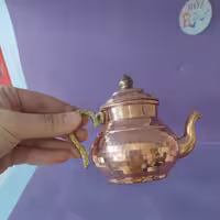 قوری  مسی کوچک ( زعفران دم کن) داخل قلع مسی  با ارتفاع 7 سانت