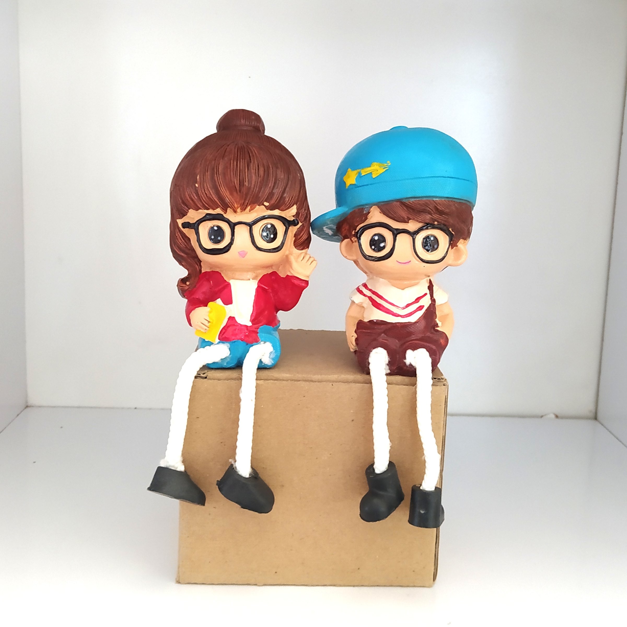 مجسمه پاشل آویز دخترپسرعینکی