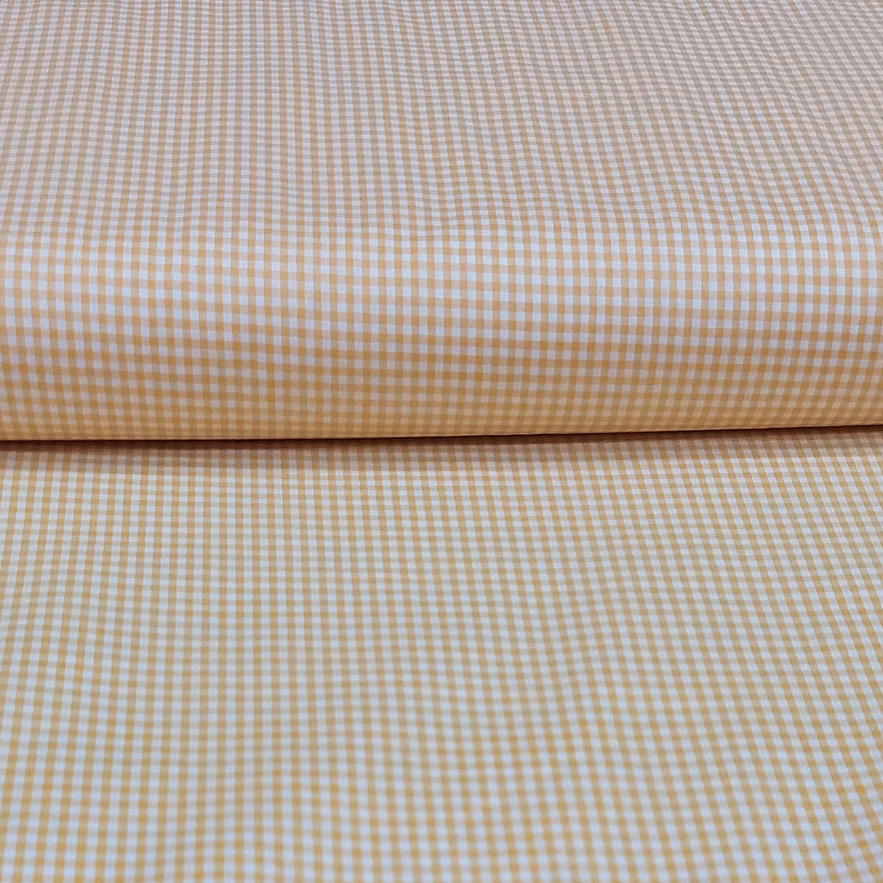 پارچه تترون چهارخانه ریز  زرد ملحفه سرای رزاق 