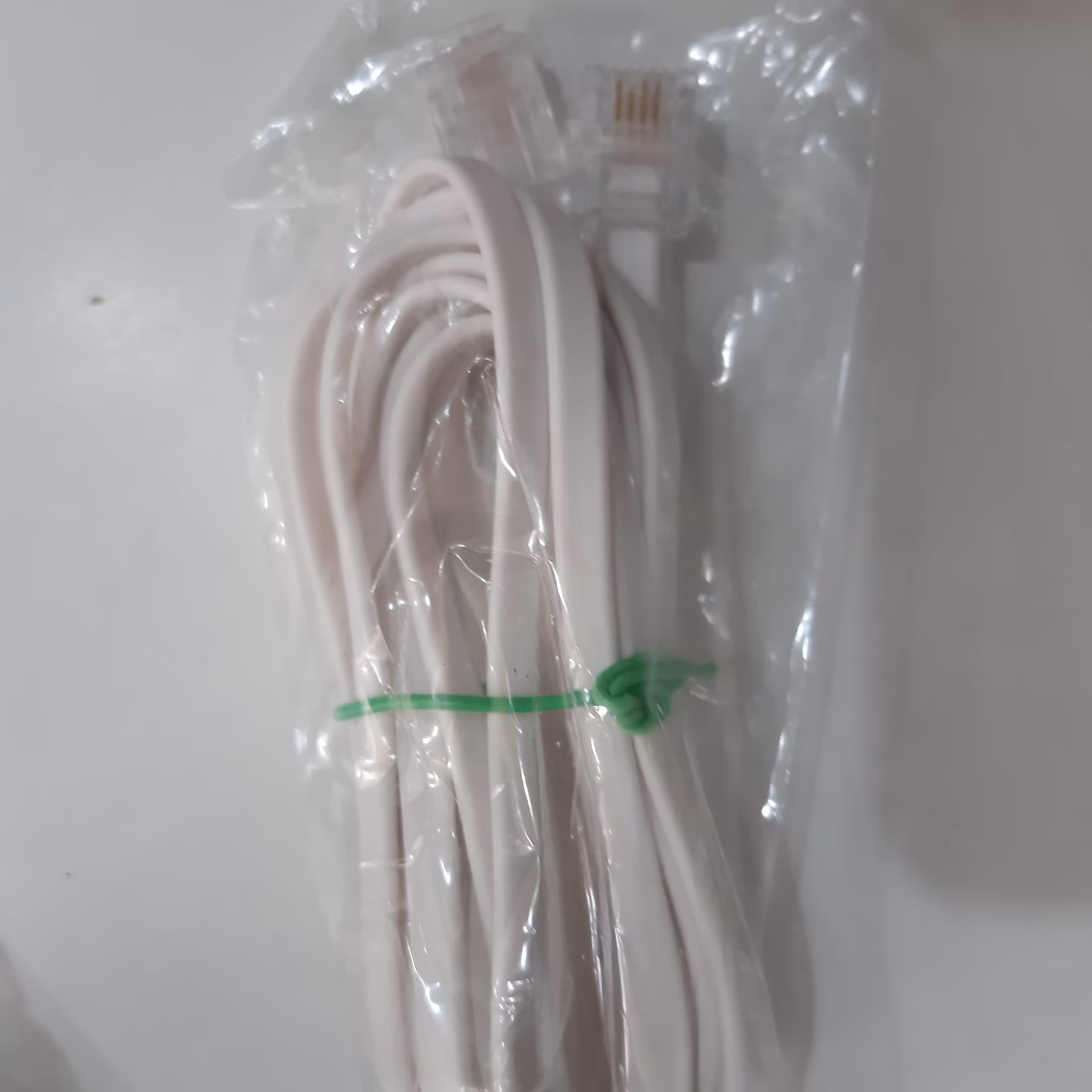 کابل تلفن 2 متری دو زوج رنگ سفید