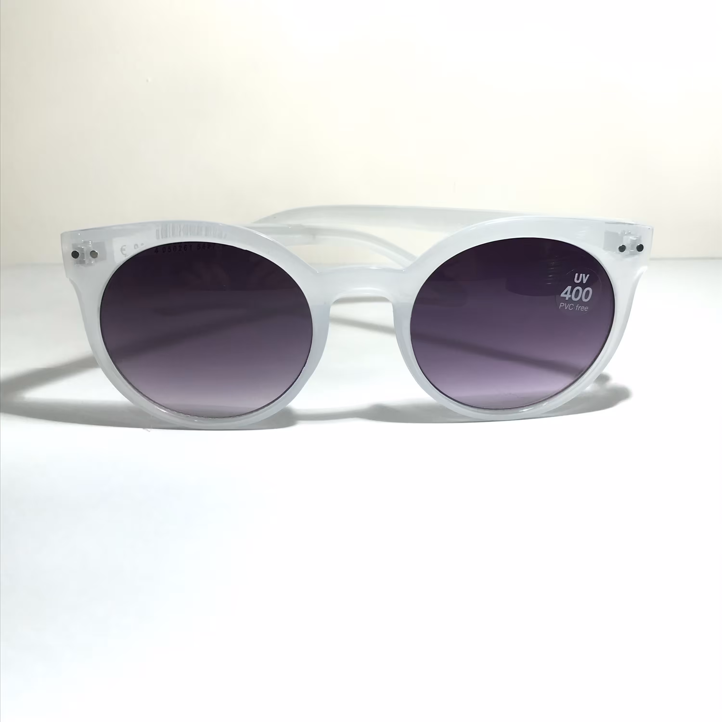عینک آفتابی زنانه فریم گرد سفید UV400 کائوچویی برند اکسسوری