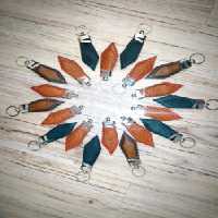 جاسوئیچی چرم طبیعی با سرکلیدی طرح لبخند خارجی