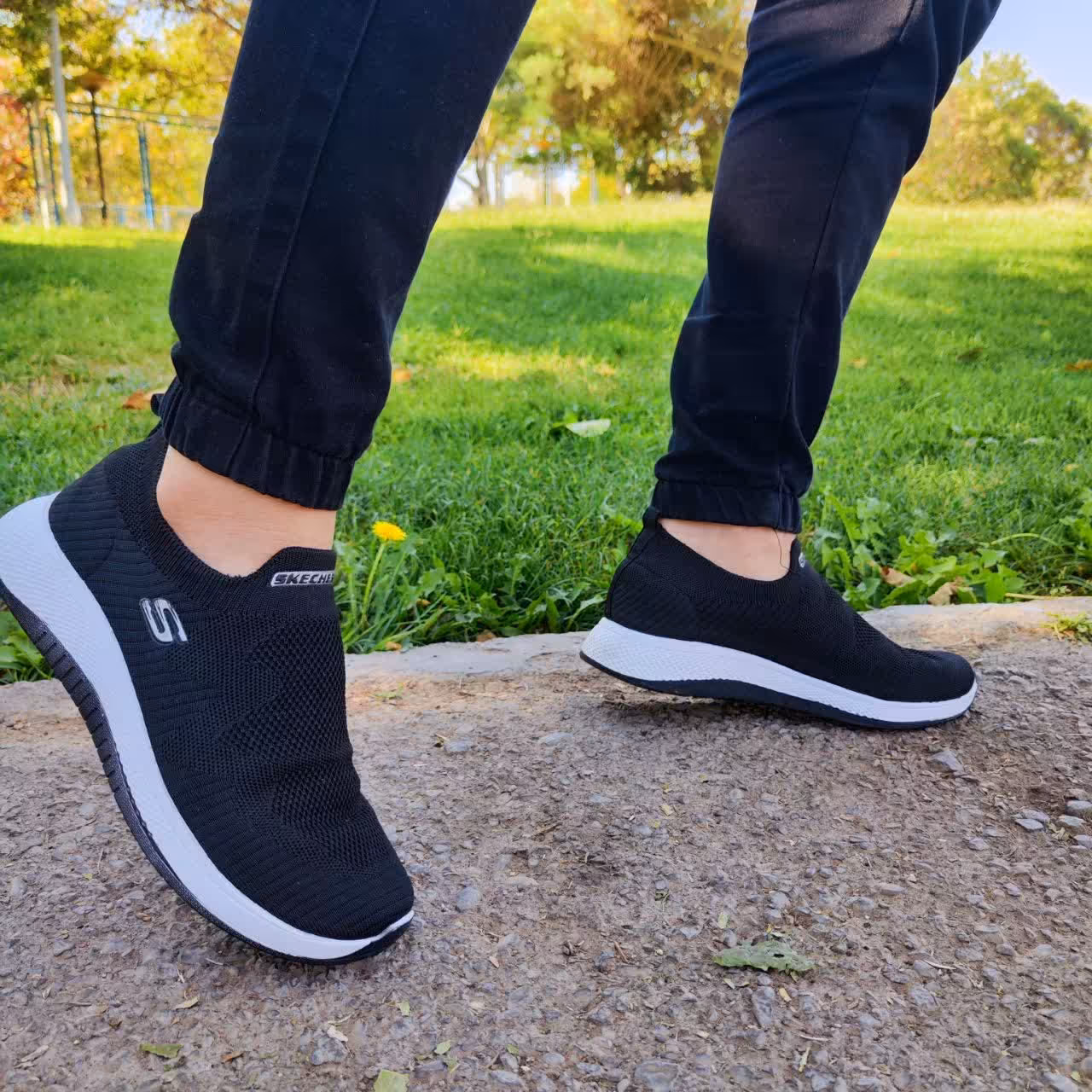 اسکیچرز مردانه مشکی بافت