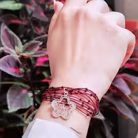 دستبند نقره و نخ و مهره