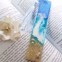 بوکمارک یا نشانگر کتاب رزینی طرح دریا با آویز ابریشمی