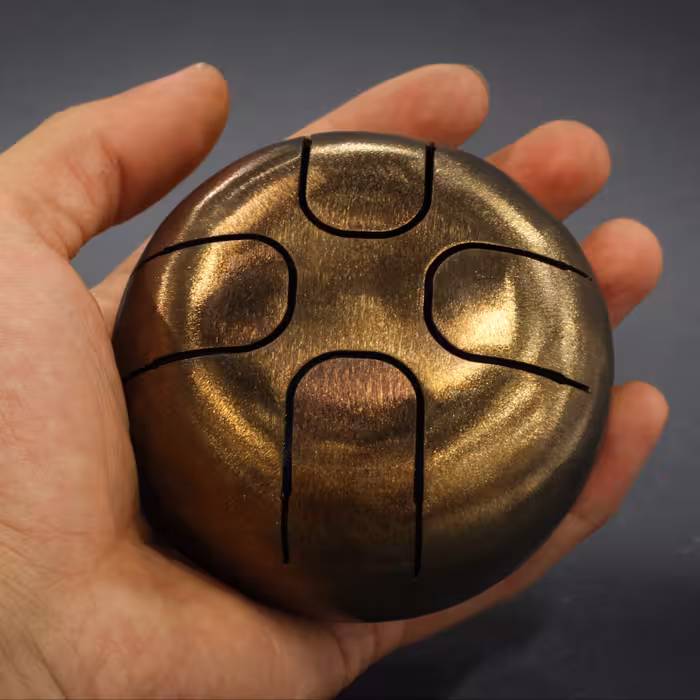 تاینی درام طلایی نه سانت دلکو(سمبلی از خانواده هندپن)