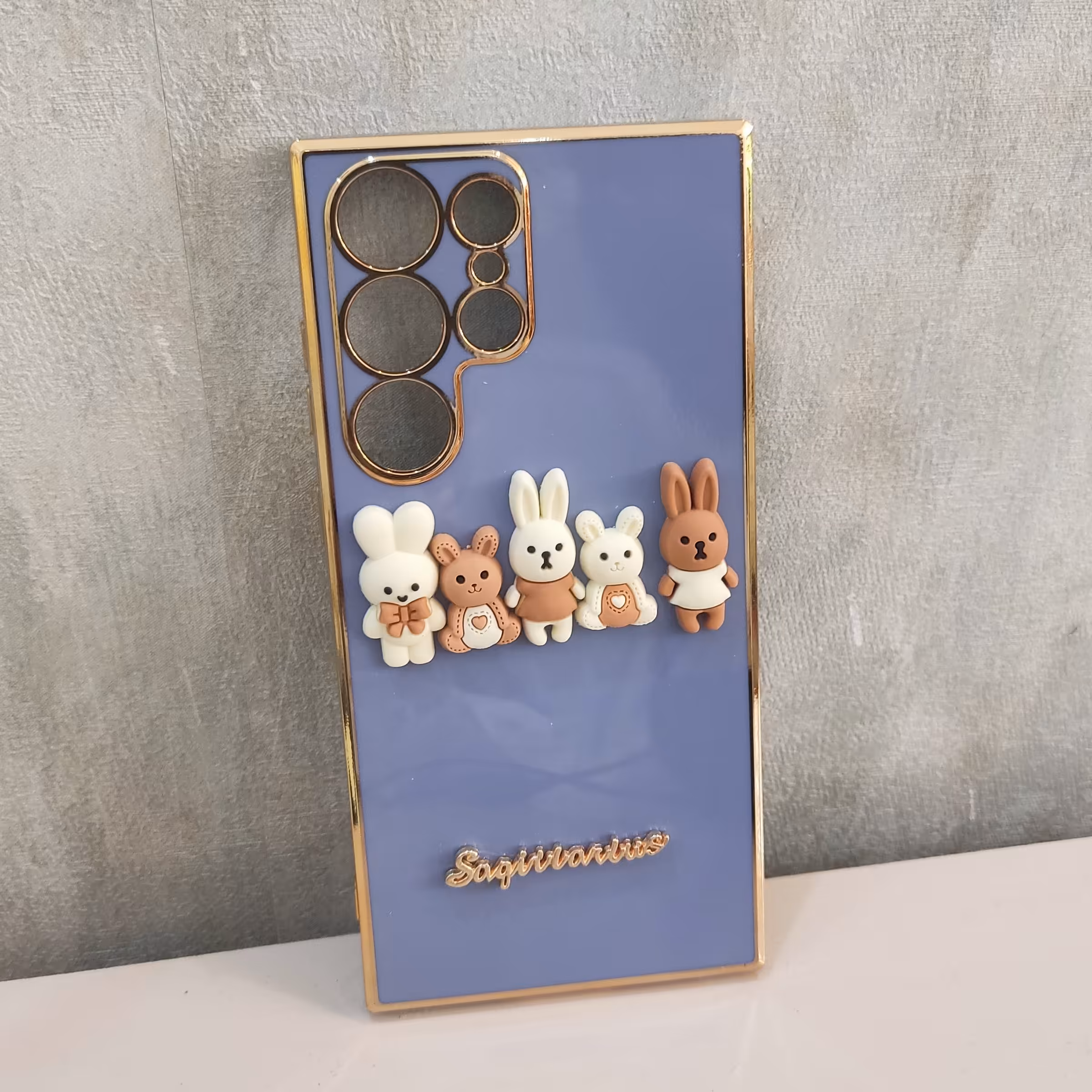 قاب موبال خرگوشی خرسی دور طلایی مدل  S23 ultra ابی کدر