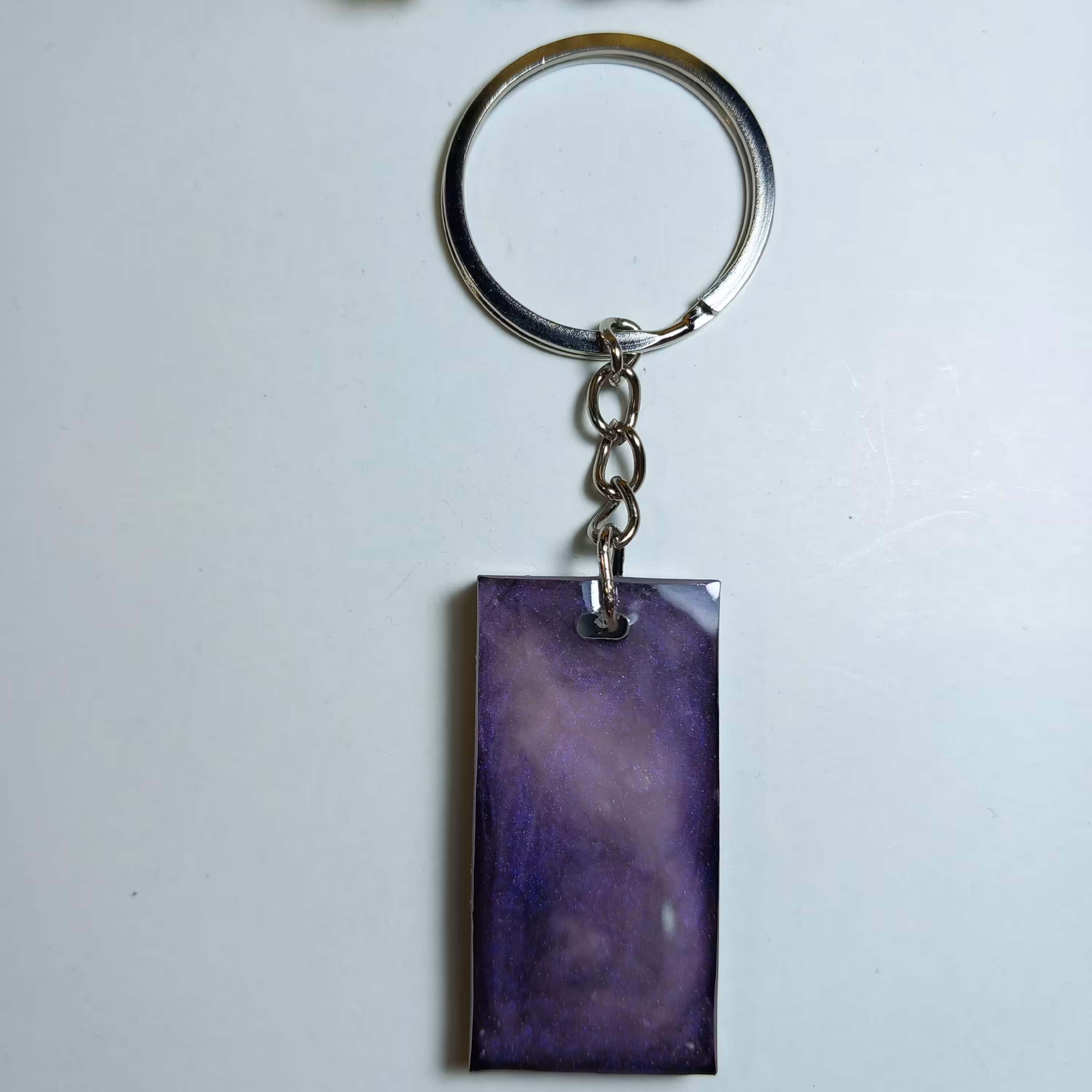 جاسوئیچی رزینی طرح کهکشانی در 2 رنگ سبز و بنفش بسیار شیک و زیبا