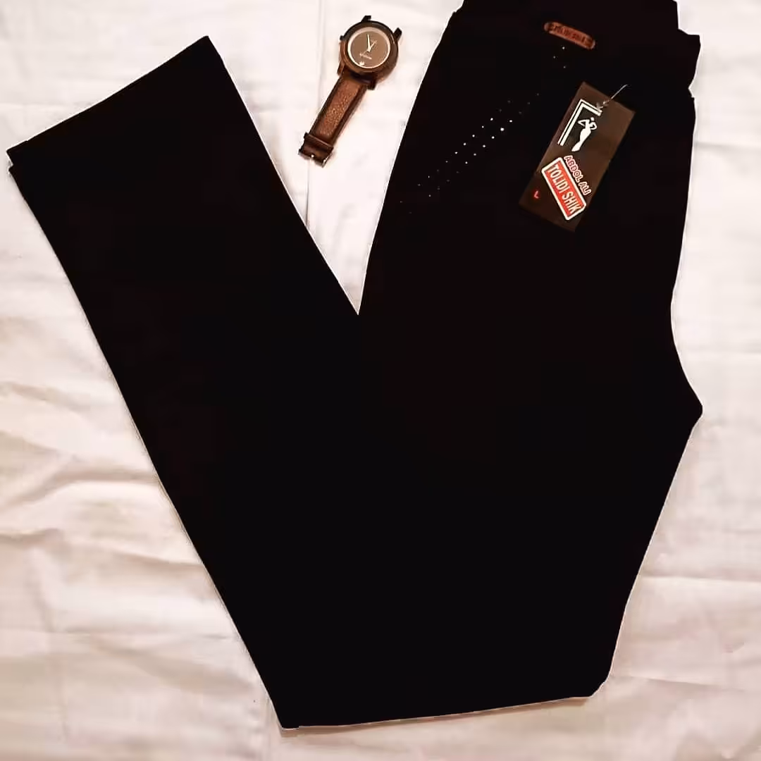 شلوار پارچه  ای بافت دار کمر کش جذب دم پا راسته