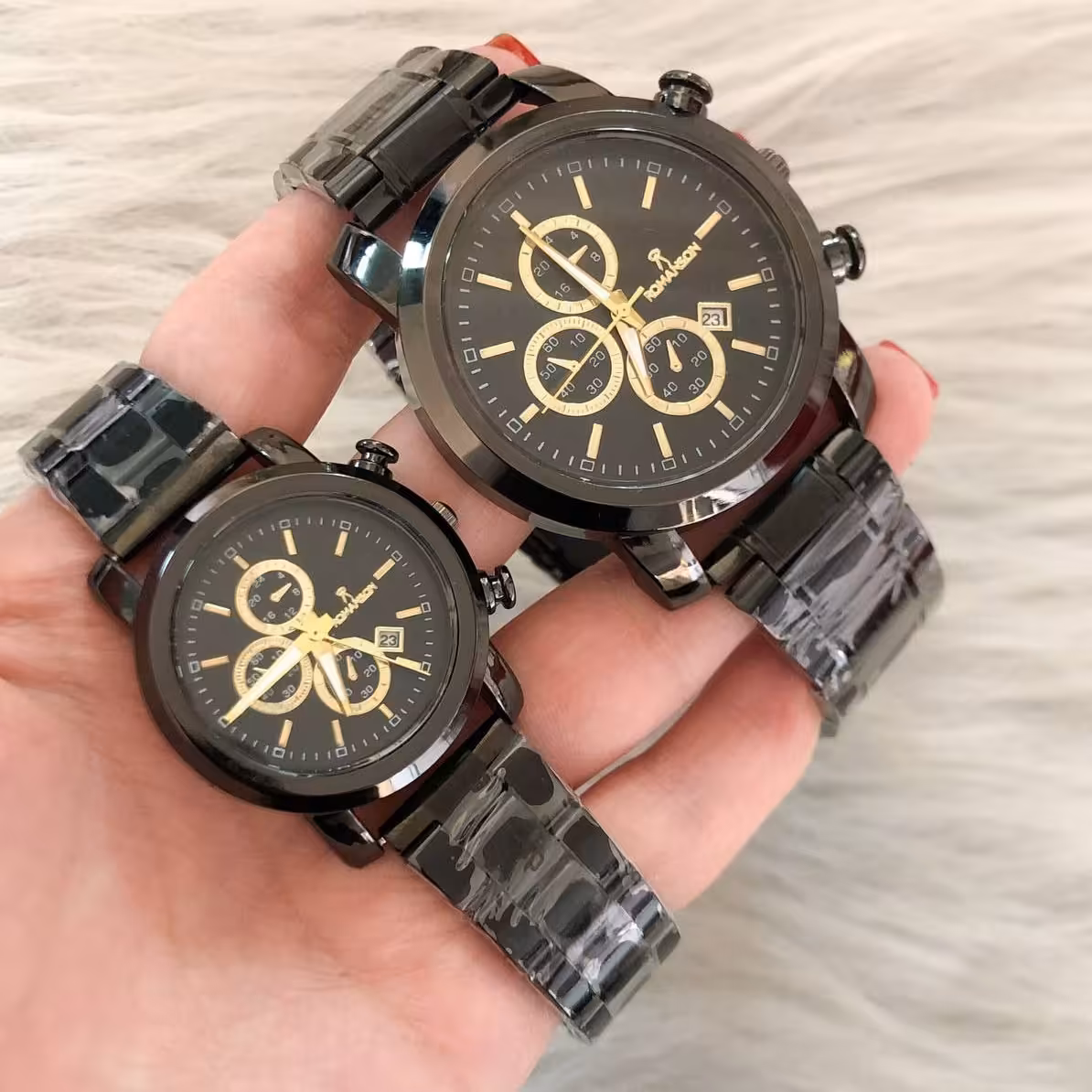 ست ساعت زنانه و مردانه مارک رومانسون بنداستیل مشکی صفحه مشکی طرح سه موتوره 